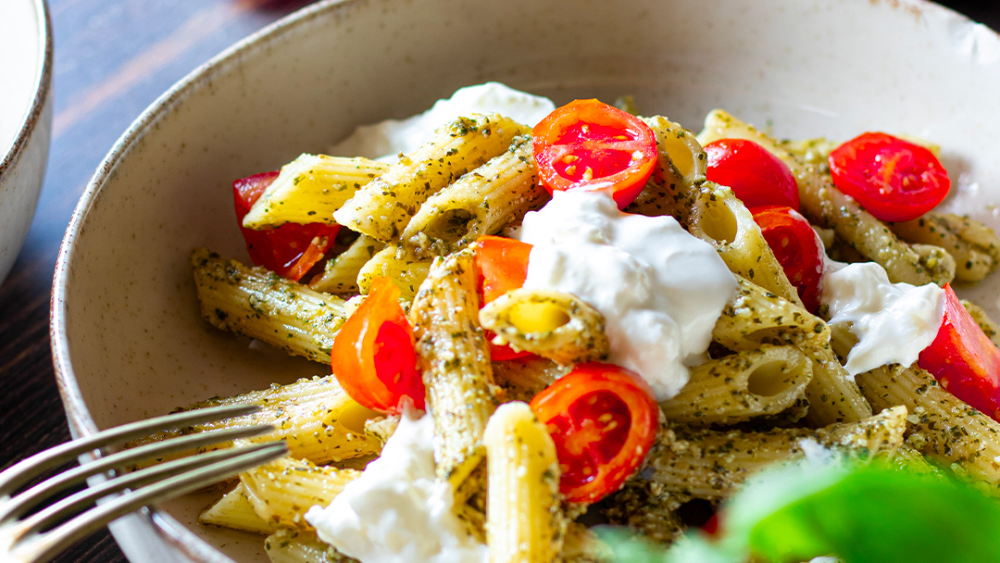 Delverde Penne Zita pasta with basil pesto, mint and fresh cherry tomatoes